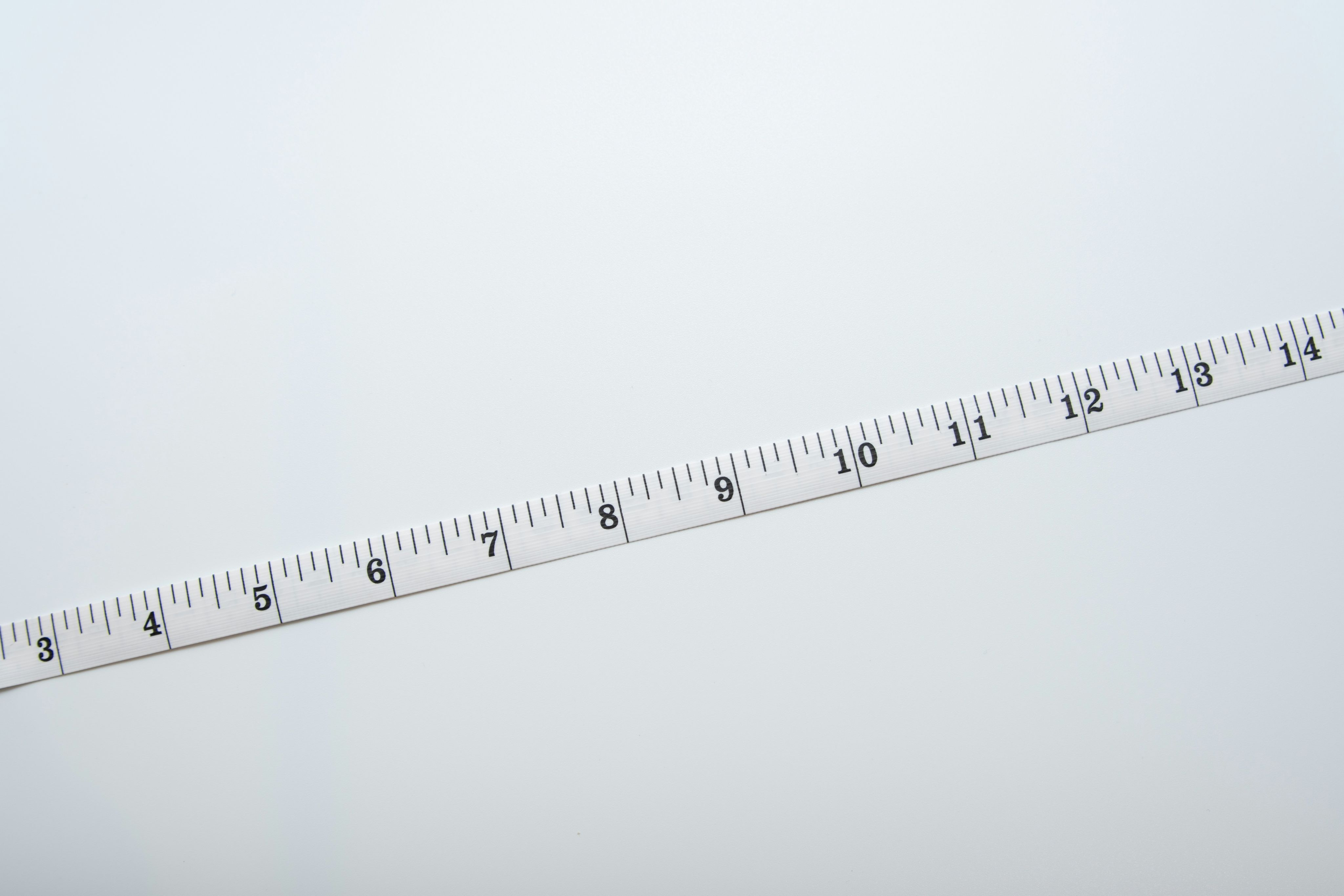 a measuring tape with a white background