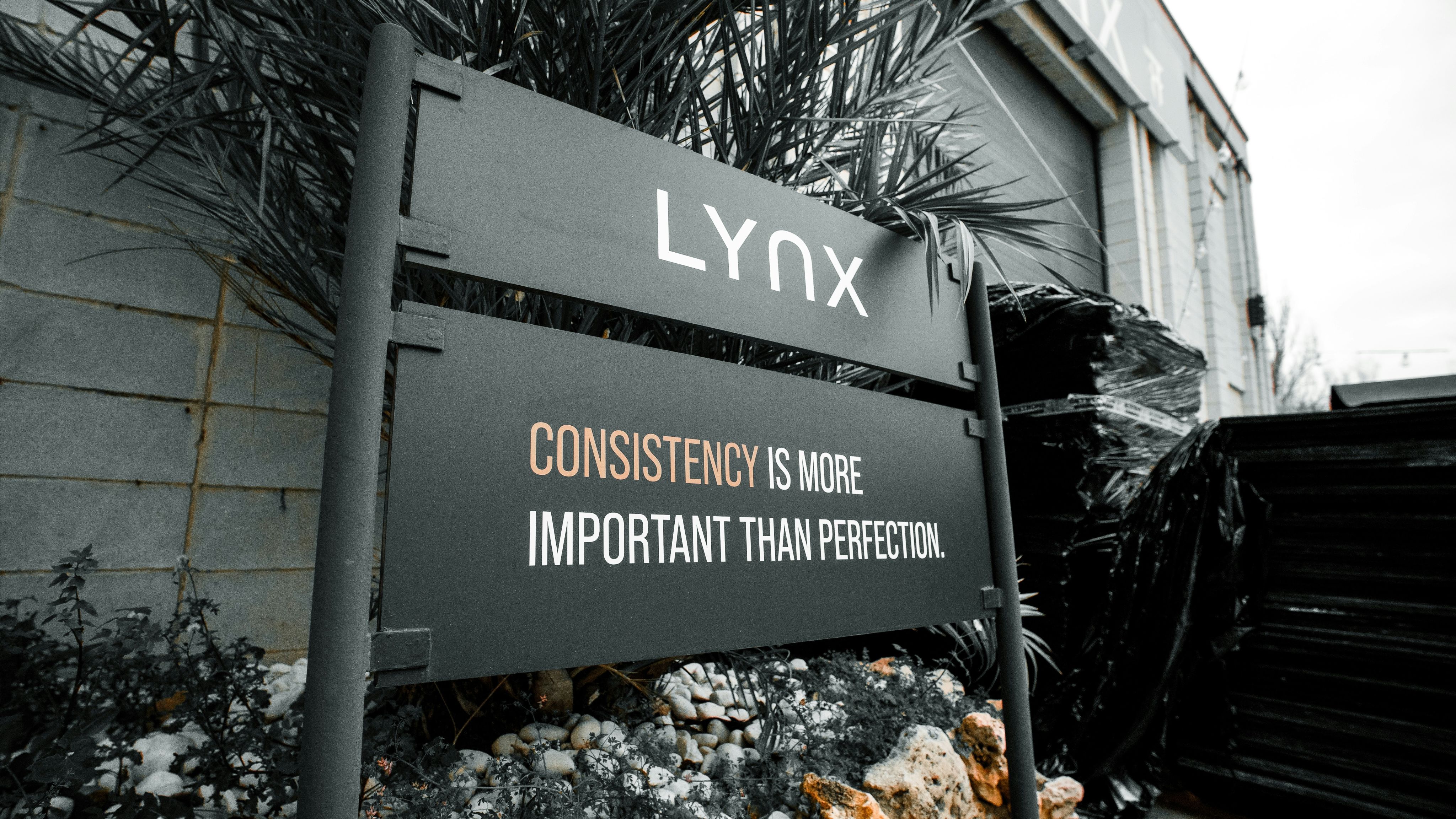 A sign that is in front of a building